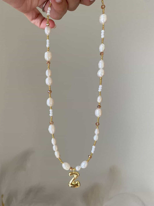 Luna necklace with a gold bubble Z initial