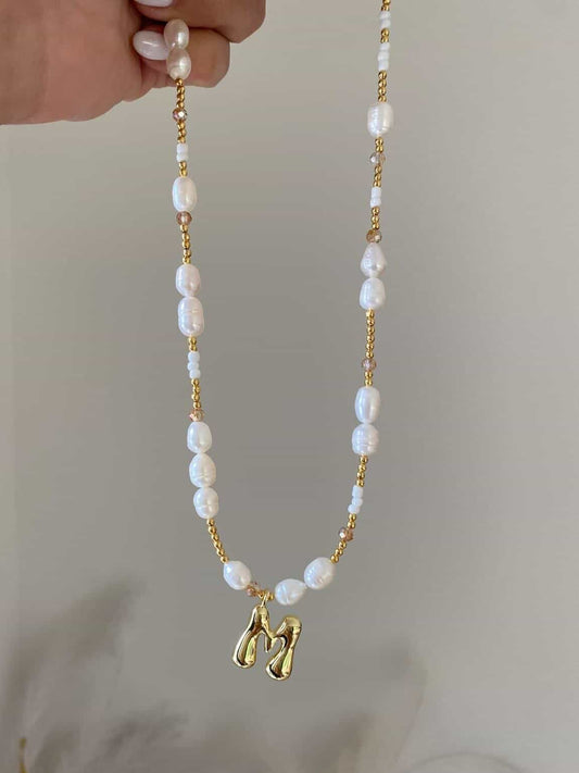 Luna necklace with a gold bubble M initial
