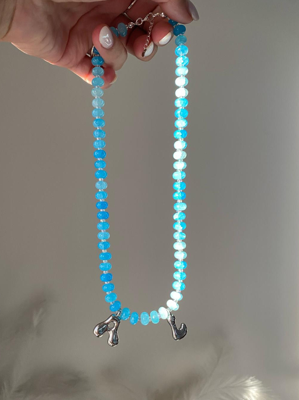 Gloria necklace with two silver bubble initial charms or A and L
